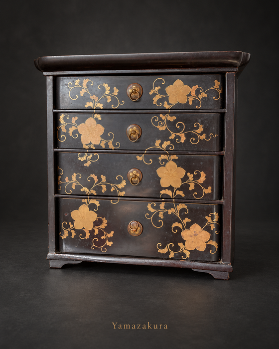 Japanese four-drawer lacquer chest with gold floral decoration; Yamazakura styled presentation
